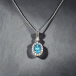 Oval Blue Topaz Halo Pendant thumbnail 2
