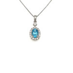 Oval Blue Topaz Halo Pendant thumbnail 1