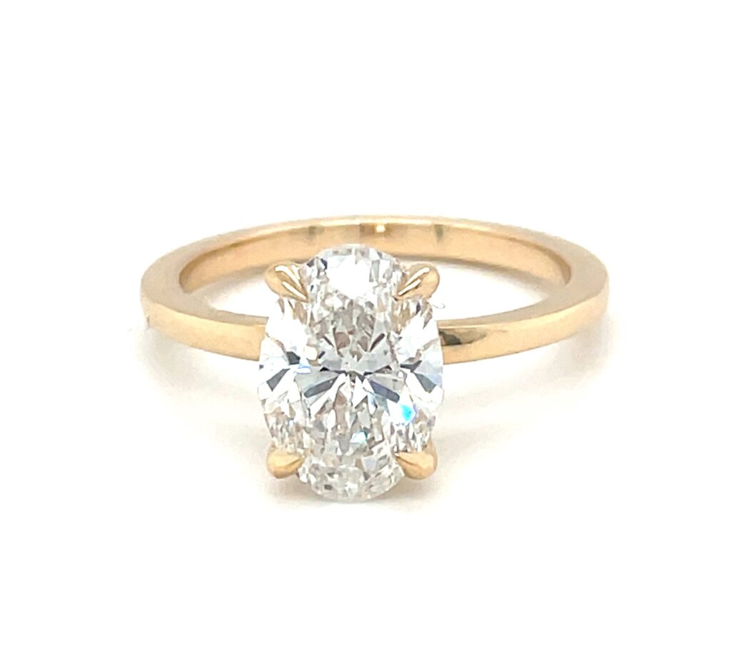 Oval Hidden Halo Engagement Ring