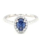 Oval Tanzanite Halo Ring thumbnail 1